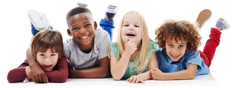 Four children, smiling and hanging out